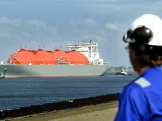 epa09848331 (FILE) - Bahamas-registered LNG tanker ship 'Arctic Voyager' arrives in the port of Rotterdam, the Netherlands, 06 July 2011 (reissued 26 March 2022). The US committed to deliver additional liquified natural gas (LNG) volumes for the EU market of at least 15 billion cubic metres in 2022, according to a joint US-EU statement published on 26 March 2022. The move is aimed at making the EU less dependent on Russian fossil energy. EPA/Lex van Lieshout *** Local Caption *** 02811868