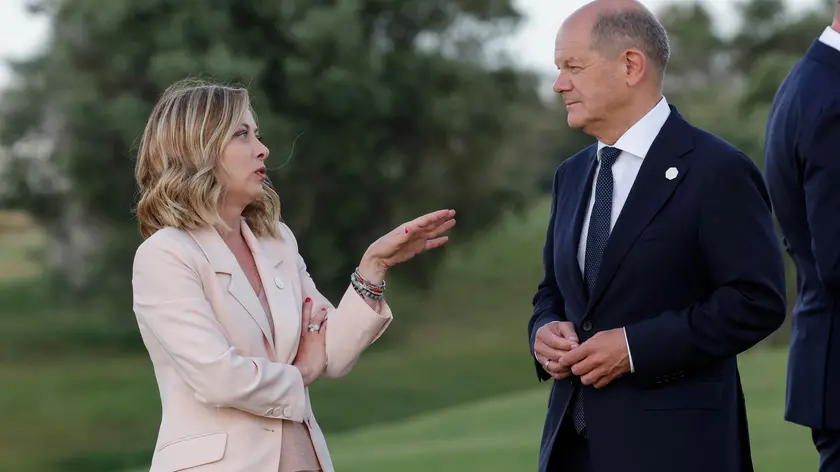 (L-R) Italian Prime Minister Giorgia Meloni and German Chancellor Olaf Scholz attend a Flag ceremony during of the G7 Summit in Borgo Egnazia (Brindisi), southern Italy, 13 June 2024. The G7 Borgo Egnazia Summit will be held from 13 to 15 June 2024. ANSA/GIUSEPPE LAMI