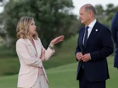 (L-R) Italian Prime Minister Giorgia Meloni and German Chancellor Olaf Scholz attend a Flag ceremony during of the G7 Summit in Borgo Egnazia (Brindisi), southern Italy, 13 June 2024. The G7 Borgo Egnazia Summit will be held from 13 to 15 June 2024. ANSA/GIUSEPPE LAMI