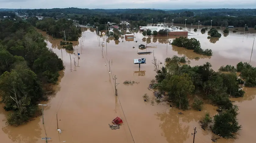 epa11632574 A handout photo made available by the North Carolina Division of Aviation showing an aerial view of flood damage caused by the storm that started as Hurricane Helene in Silver Creek, North Carolina, USA, 29 September 2024. Many parts of the southeastern portion of the United States, including western North Carolina and Tennessee, have been affected by the heavy rains and wind brought by the storm, which has killed at least 64 people. EPA/NORTH CAROLINA DIVISION OF AVIATION HANDOUT HANDOUT EDITORIAL USE ONLY/NO SALES