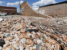 epa11634206 A collapsed wall of a building damaged by over the weekend by Hurricane Helene in Valdosta, Georgia, USA, 30 September 2024. Many parts of the southeastern portion of the United States were affected by heavy rains and wind brought by the storm, which has killed nearly 100 people and left hundreds of thousands without power. EPA/ERIK S. LESSER