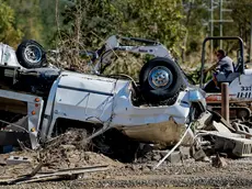 epa11638999 A destroyed vehicle from V J's Auto Service, a 40-year-old vehicle maintenance shop, in the River Arts District in the aftermath of catastrophic flooding caused by Tropical Storm Helene in Asheville, NC, USA, 02 October 2024. The mountainous areas of North Carolina, South Carolina and Tennessee were hit particularly hard. More than 150 people are reported dead due to Hurricane Helene in the Southeastern US. Many of the businesses and building owners did not have flood insurance. EPA/ERIK S. LESSER