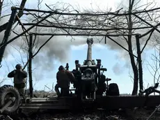 epa10500960 Ukrainian soldiers fire a FH70 howitzer from their position in the Zaporizhzhia area, Ukraine, 02 March 2023 (issued 03 March 2023) Russian troops entered Ukrainian territory on 24 February 2022, starting a conflict that has provoked destruction and a humanitarian crisis. EPA/STR