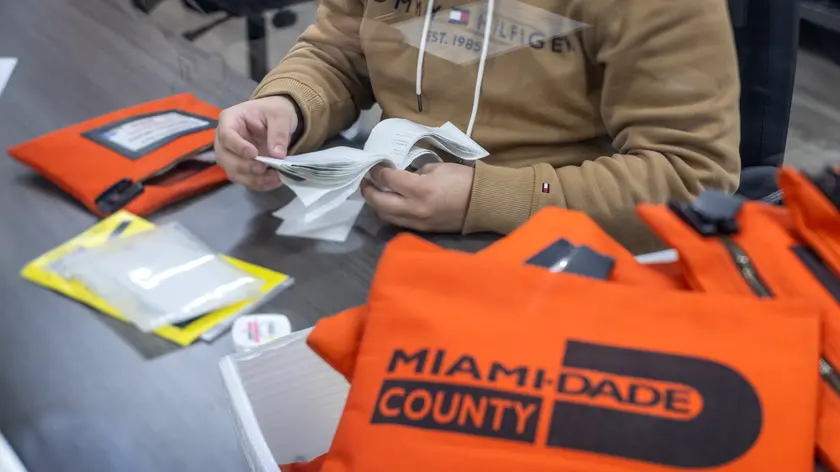 epaselect epa11701160 A Miami-Dade County Election Department's worker gets ready to scan ballots after Florida's last early voting day for the 2024 presidential election in Florida, at the Miami-Dade County Elections Department in Miami, Florida, USA, 04 November 2024. Former President Trump and Vice President and Democratic presidential nominee Kamala Harris are tied in the polls with one day until the election on 05 November. EPA/CRISTOBAL HERRERA-ULASHKEVICH