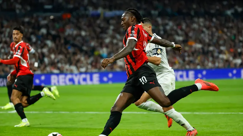 epa11703993 Real Madrid's Lucas Vazquez (R) in action against AC Milan's Rafael Leao (L) during the UEFA Champions League soccer match between Real Madrid and AC Milan, in Madrid, Spain, 05 November 2024. EPA/Juanjo Martin