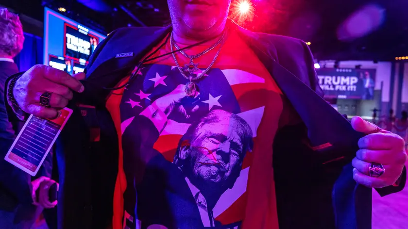 epa11704228 A supporter of former US president and Republican presidential candidate Donald Trump reacts as they wait for results of the US 2024 presidential elections during an election night watch party held in the West Palm Beach Convention Center in West Palm Beach, Florida, USA, 05 November 2024. Voters across the country are casting ballots today for President of the United States in a tightly contested race between Republican presidential candidate Donald J. Trump and Democratic presidential candidate US Vice President Kamala Harris, as well as for candidates in congressional and local races. EPA/CRISTOBAL HERRERA-ULASHKEVICH