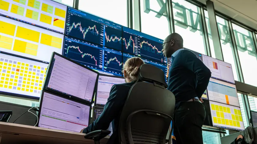 epa10538177 Market operators work in the operations room at the Euronext stock exchange headquarters in the Paris financial district of La Defense, France, 23 March 2023. Euronext is a pan-European market infrastructure, connecting European economies to global capital markets. It operates regulated exchanges in Belgium, France, Ireland, Italy, the Netherlands, Norway and Portugal. EPA/CHRISTOPHE PETIT TESSON