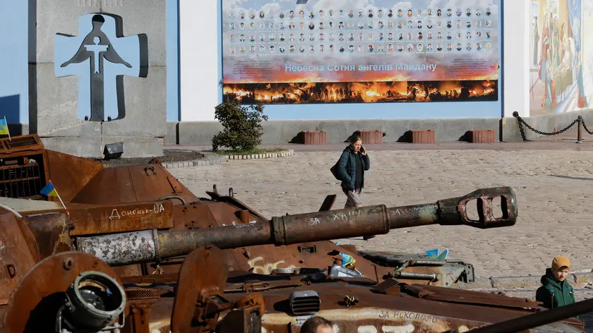 epa11675077 People walk among destroyed Russian military machinery displayed near St. Mykhailivsky Cathedral in downtown Kyiv, Ukraine, 22 October 2024, amid the ongoing Russian invasion. Russian troops entered Ukrainian territory on 24 February 2022, starting a conflict that has provoked destruction and a humanitarian crisis. EPA/SERGEY DOLZHENKO