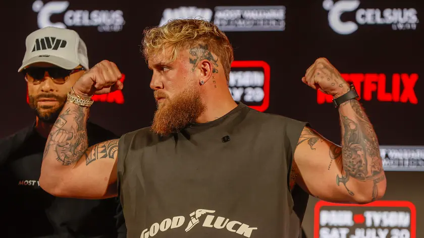 epa11346532 YouTuber and professional boxer Jake Paul flexes his muscles during a pre-fight press conference held at Texas Live in Arlington, Texas, USA, 16 May 2024. The Tyson vs Paul fight will be held at AT&T Stadium in Arlington, Texas on 20 July 2024 EPA/ADAM DAVIS