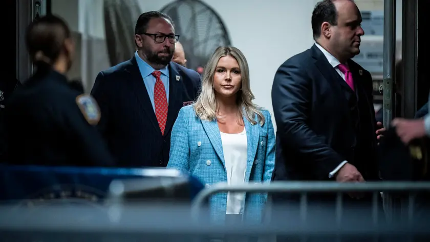 epa11377557 Karoline Leavitt (C) follows former President Donald Trump as they arrive for Trump’s criminal trial at the Manhattan Criminal Court in New York, NY, USA, 29 May 2024. Trump was charged with 34 counts of falsifying business records last year, which prosecutors say was an effort to hide a potential sex scandal, both before and after the 2016 presidential election. Trump is the first former U.S. president to face trial on criminal charges. EPA/JABIN BOTSFORD / POOL