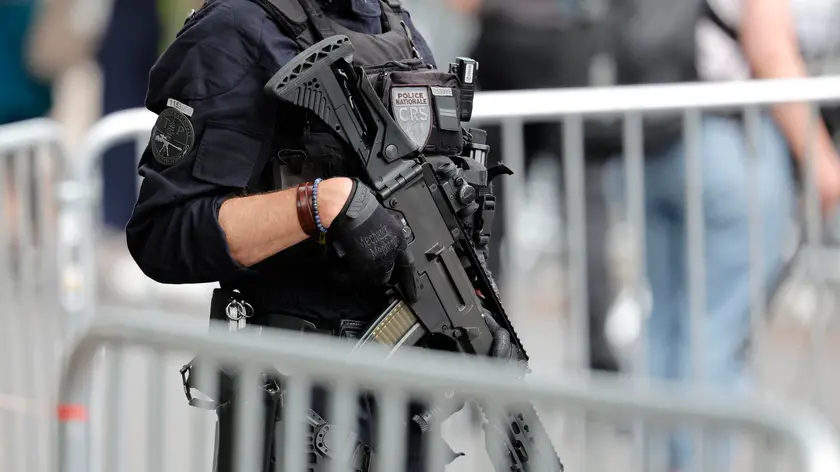 epa11497200 French police forces secure the perimeters ahead of the Opening Ceremony of the Paris 2024 Olympic Games, in Paris, France, 26 July 2024. EPA/RONALD WITTEK