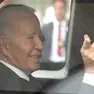 epa11724925 US President Joe Biden gestures upon his arrival at the Convention Center in Lima, Peru, 16 November 2024. Biden will hold meetings within the framework of the Asia-Pacific Economic Cooperation (APEC) leaders' summit. The Asia-Pacific Economic Cooperation (APEC) leaders' week is held in Lima from 10 to 16 November 2024. EPA/PAOLO AGUILAR