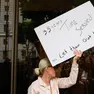 epa11663385 A person holds up a sign as family members of Erik and Lyle Menendez hold a news conference to call for their release from prison after the brothers were convicted in 1996 of first-degree murder for the 1989 shooting of their parents, Jose and Kitty Menendez, outside of the Clara Shortridge Foltz Criminal Justice Center in Los Angeles, California, USA, 16 October 2024. The Los Angeles County District Attorney's Office announced earlier this month at a news conference that they would be reevaluating the brothers' convictions. The brothers are currently serving life sentences in state prison without the possibility of parole. EPA/CAROLINE BREHMAN