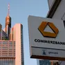 epa10493436 A exterior view of the German Commerzbank tower behind a bank braches logo in Frankfurt am Main, Germany, 27 February 2023. Commerzbank AG will return into the group of 40 businesses listed in German Stock Market Index DAX on 27 February. The bank lost its rank in the DAX in autumn 2018 due to severe loss in their stocks value. The bank, that was one of the founding businesses of the DAX, can now return due to the withdrawal of the Linde company from trading at the Franfurt Stock exchange, the 'Deutsche Boerse Group' said on their website. EPA/RONALD WITTEK