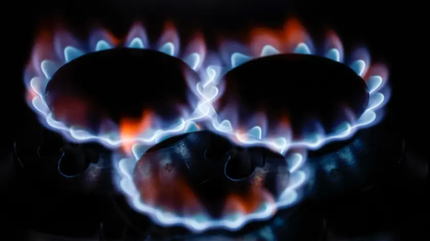 Gas flames burning on a stove in a kitchen, Rome 14 March 2023. ANSA/FABIO FRUSTACI