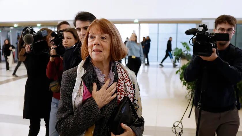 epa11739299 Gisele Pelicot (C) arrives at the criminal court in Avignon, France, 25 November 2024, where her ex-husband stands trial. Dominique Pelicot is accused of drugging and raping his then-wife, Gisele Pelicot. He is also accused of inviting dozens of men to rape her while she was unconscious at their home in Mazan, France, between 2011 and 2020. Fifty other men are facing trial for their alleged involvement. Dominique Pelicot could face a maximum sentence of 20 years in prison if convicted. EPA/YOAN VALAT