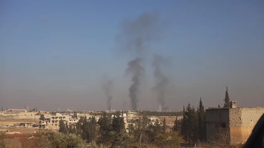 epa11750030 Smoke billows after airstrikes by Russian warplanes targeting the city of Aleppo, Syria, 30 November 2024, following a large offensive by rebel forces November 27, taking large parts of the country's second biggest city. The offensive triggered Russian strikes on Aleppo, the first since 2016, and saw Syria's military withdraw its troops from the city. The attack was led by the Islamist militant group Hayat Tahrir al-Sham (HTS). EPA/Mohammed Al-Rifai
