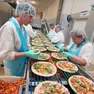 Meduno. Lavoratori all'interno dello stabilimento Roncadin.