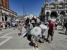 Turisti in Piazza San Marco