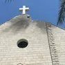 Una immagine della chiesa della Sacra famiglia a Gaza mostra i danni dopo l'attacco che ha provocato due morti e 11 feriti. Ferito anche padre Gabriel Romanelli, il parroco