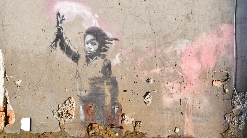 Il Migrant Child, il Bambino Migrante di Banksy