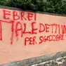 La scritta comparsa il 14 maggio scorso sul muro del galoppatoio al Lido di Venezia