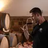Cristian Specogna, 38 anni, nella cantina dell'azienda vinicola di famiglia, sulla Rocca Bernarda, in Friuli
