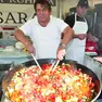 Al lavoro negli stand di Gusti di Frontiera, in una delle edizioni passate. Foto Bumbaca