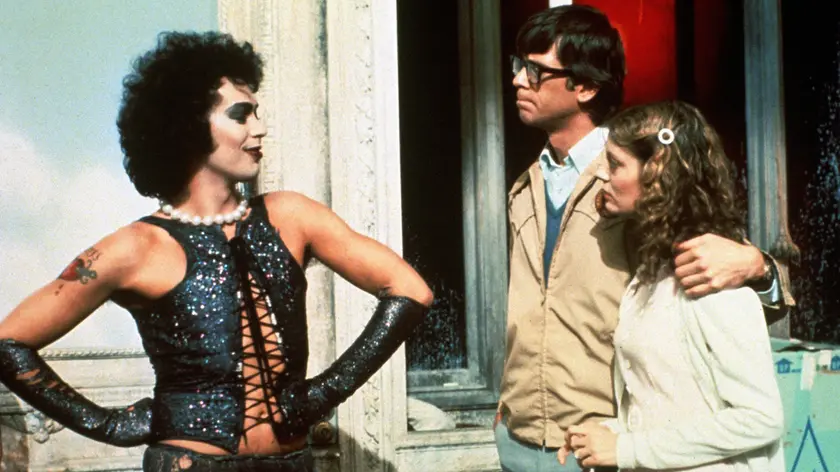 Gli attori Tim Curry, Barry Bostwick, Susan Sarandon in una scena del film uscito nel 1975