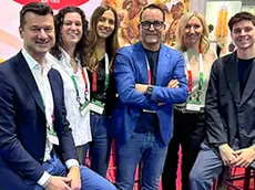 Dario Roncadin, al centro con la giacca blu, con i suoi collaboratori americani