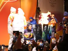 L'accensione del braciere olimpico a Cortina