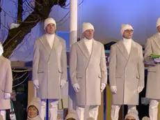 Riccardo, a sinistra, e a destra la staffetta d'oro del fondo a Torino 2006