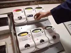 Contatori di energia elettrica in un palazzo, Genova 14 marzo 2018 .ANSA/LUCA ZENNARO