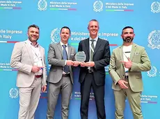 Il premio ritirato da Abbate, Gardenal, Pecci e Fornasier