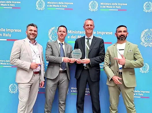 Il premio ritirato da Abbate, Gardenal, Pecci e Fornasier