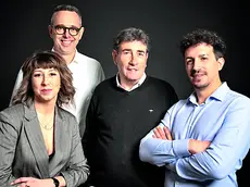 Federica, Daniele e Luca Querinuzzi con Dino Boscariol guidano oggi l'azienda friulana Compass