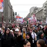 epa11966398 Protesters wave Serbian flags during the student-led rally in Belgrade, Serbia, 15 March 2025. University students staged a protest, demanding accountability after fifteen people lost their lives in the collapse of the Novi Sad Railway Station canopy in November 2024. The station building, which had been renovated and reopened in July 2024, was undergoing further renovations shortly before the collapse. EPA/ANDREJ CUKIC