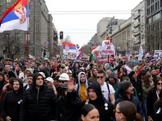 epa11966398 Protesters wave Serbian flags during the student-led rally in Belgrade, Serbia, 15 March 2025. University students staged a protest, demanding accountability after fifteen people lost their lives in the collapse of the Novi Sad Railway Station canopy in November 2024. The station building, which had been renovated and reopened in July 2024, was undergoing further renovations shortly before the collapse. EPA/ANDREJ CUKIC