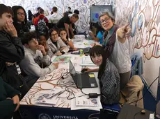 Una delle attività per i più giovani organizzate in uno degli stand di Trieste Next foto Andrea Lasorte