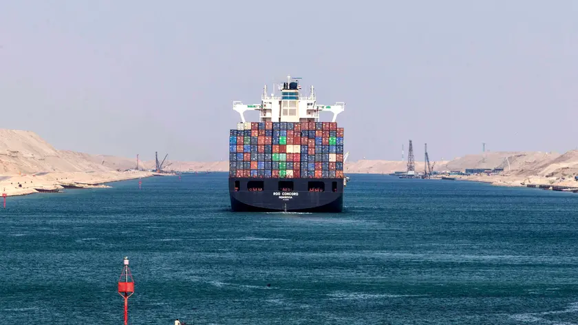 epa09092722 (FILE) - Liberian-flagged container ship RDO CONCORD sails through the Suez Canal in Ismailia, Egypt, 17 November 2019 (reissued 24 March 2021). A large container ship registered in Panama ran aground in the Suez Canal on 23 March, blocking passage to other ships and causing a traffic jam for cargo vessels. EPA/MOHAMED HOSSAM