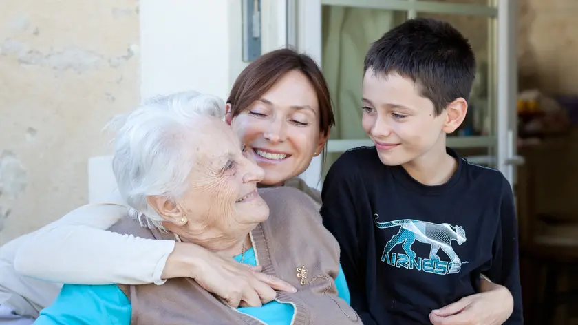 94 years old woman and her family.