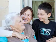 94 years old woman and her family.