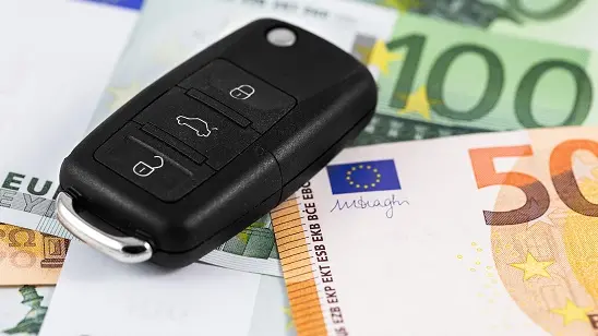 closeup euro money with car key