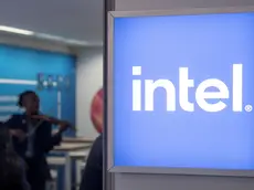 FILE PHOTO: The Intel Corporation logo is seen at a temporary office during the World Economic Forum 2022 (WEF) in the Alpine resort of Davos, Switzerland May 25, 2022. REUTERS/Arnd Wiegmann/File Photo
