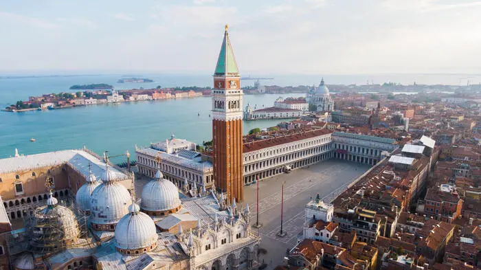 View of Saint Marco square during the lockdown emergency period aimed at stopping the spread of the Covid-19 coronavirus. Although the lockdown and full absence of people, the scenery of the Italian squares and monuments remain fascinating, Venice, Italy, 28 April 2020. (ANSA foto Fabio Muzzi)