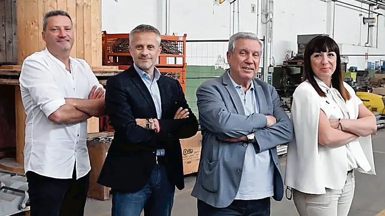 Pompeo Tria con i figli Anna e Paolo e il socio Maurizio Bottazzi