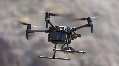 epa07759001 The Civil Guard shows a drone in Santa Cruz de Tenerife, Canary Islands, Spain, 06 August 2019, during the presentation of the new system to fine traffic offenders. The Canary Islands will be the first Spanish region to incorporate drones into regulating traffic. Traffic offenders will find it more difficult to avoid fines as drones will be in charge of showing agents the drivers' behavior on the road. EPA/CRISTOBAL GARCIA