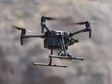 epa07759001 The Civil Guard shows a drone in Santa Cruz de Tenerife, Canary Islands, Spain, 06 August 2019, during the presentation of the new system to fine traffic offenders. The Canary Islands will be the first Spanish region to incorporate drones into regulating traffic. Traffic offenders will find it more difficult to avoid fines as drones will be in charge of showing agents the drivers' behavior on the road. EPA/CRISTOBAL GARCIA