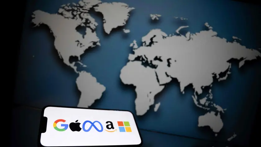 A picture shows logos of the main communication brand also named GAFAM (for Google, Apple, Facebook, Amazon and Microsoft)in Mulhouse, on June 2, 2023. (Photo by SEBASTIEN BOZON / AFP)