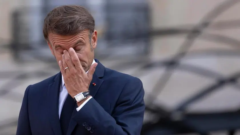 epa11569759 French President Emmanuel Macron gestures as he arrives to welcome the Heads of state for a reception at the Elysee Palace in Paris, France, 28 August 2024. The Paralympic Games of Paris 2024 will be held from August 28 to September 08, 2024. EPA/ANDRE PAIN